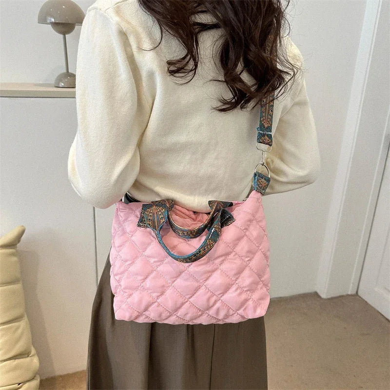 Elevate your style with these luxury designer shoulder crossbody bags for women. Featuring a quilted padded design from a top designer brand, these handbags are perfect for adding a touch of elegance to any outfit. -
