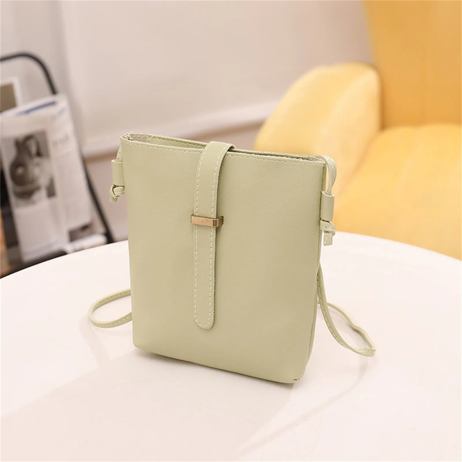 Stay on trend with this fashionable drawstring lady bag, featuring a stylish cross-border design and casual letter detail. Perfect for adding a chic and trendy touch to your outfit! -