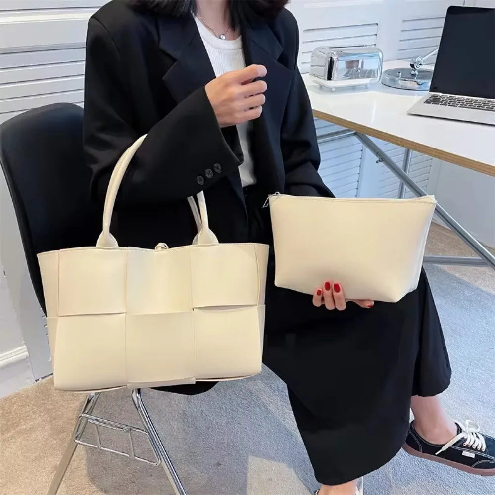 Make a fashion statement with this large capacity handbag. Crafted with stylish woven leather, this tote bag is perfect for adding a touch of elegance to your everyday outfit. -