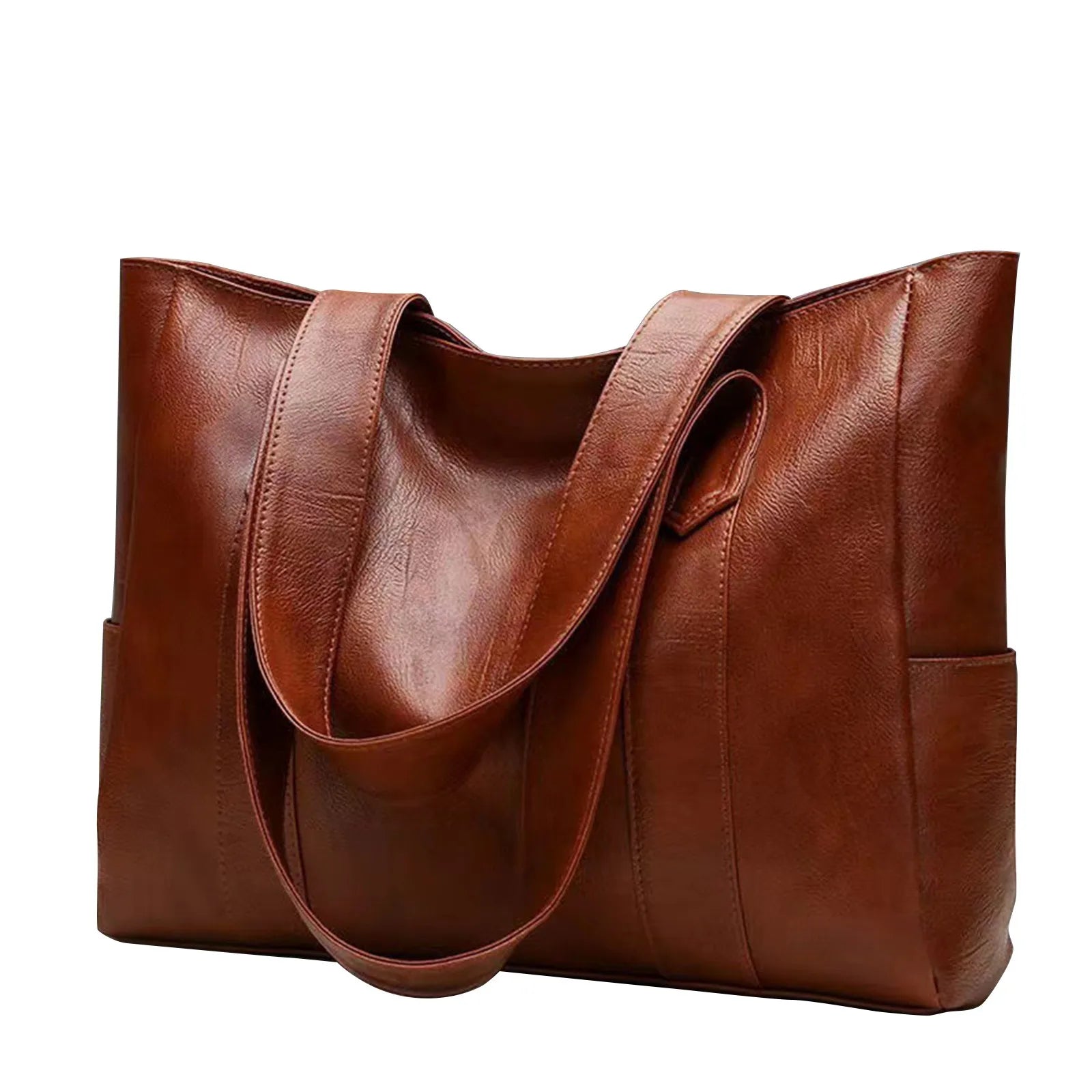 Carry all your essentials in style with this large capacity tote bag designed for women. The single shoulder handbag is crafted from soft leather, providing a chic and versatile accessory for any outfit. -