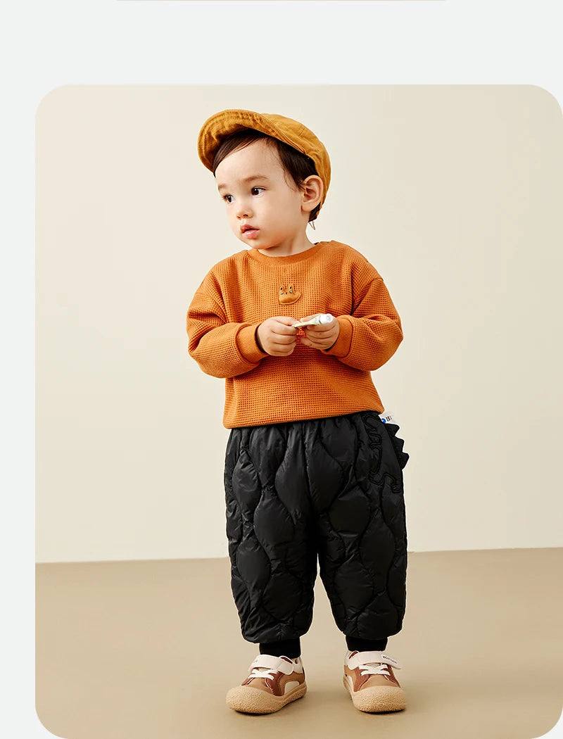 Keep your kids cozy and protected with these new style three-proof high-waisted warm down trousers—perfect for boys and girls on chilly days! -
