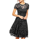 Make a chic statement with this elegant women's dress featuring an O-neck design, transparent lace, and hollow detail—a perfect choice for a sophisticated and stylish look. -