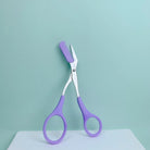 Eyebrow trimming scissors with built-in comb -