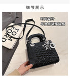 Make a style statement with this fashionable business tote bag designed for women. Featuring a touch of luxury, this bag is the perfect accessory to complement your professional look while adding a touch of elegance and sophistication. -