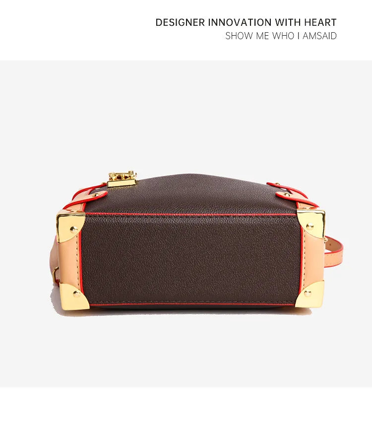 Make a statement with this luxurious and elegant box bag for women. Crafted from high-quality leather, this shoulder handbag features an elegant top-handle design, exuding sophistication and style for a classy finishing touch to your ensemble. -