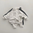 Keep your little one stylish and comfy with this cool two-piece baby suit—featuring a letter-printed zip-up top and matching leisure sports pants! -