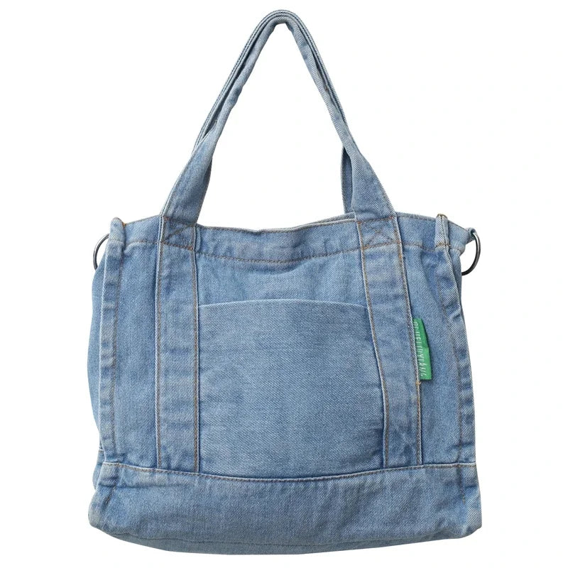 Elevate your casual look with this denim shoulder bag for women. Featuring a large design and zipper closure, this bag is perfect for shopping and everyday use, adding a touch of style to your outfit. -