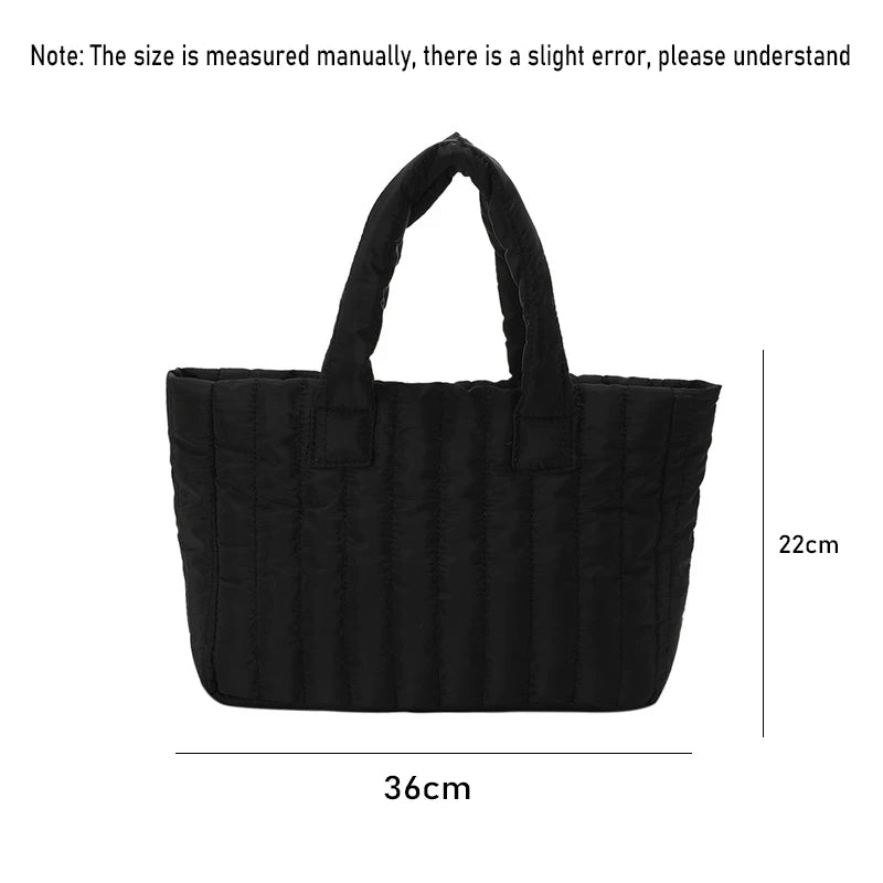Carry your essentials in style with this large capacity and cotton-padded tote bag designed for ladies. Featuring a solid color and casual fashion, this bag is both practical and fashionable for everyday use. -