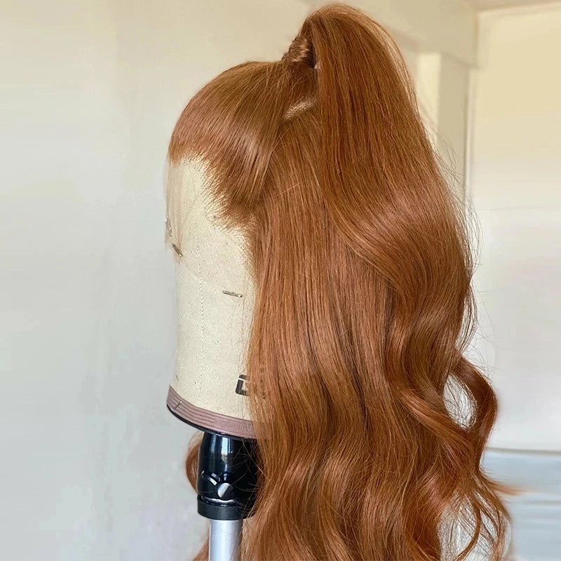 Transform your look with this ginger orange wavy hair synthetic lace front wig. With a soft and heat-resistant design, this 26-inch long wig is glueless, preplucked, and perfect glueless. -