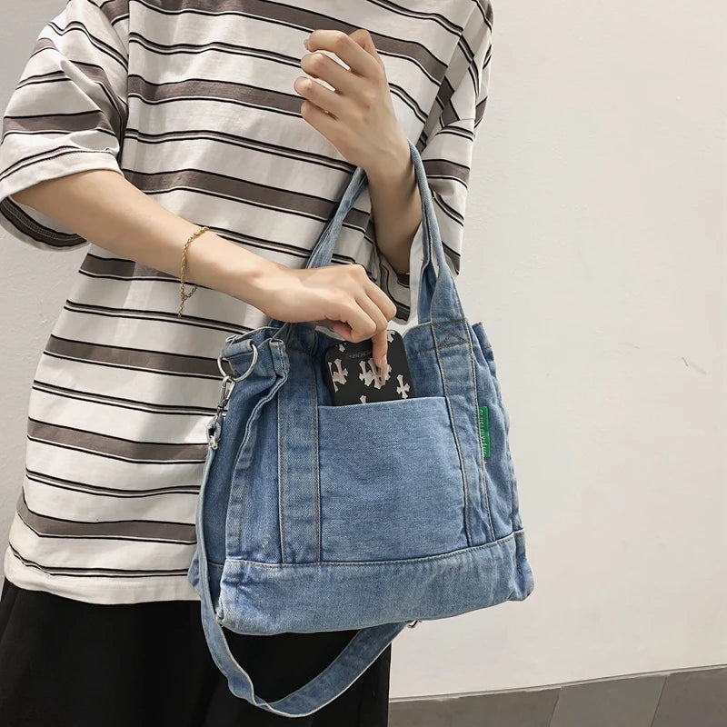 Elevate your casual look with this denim shoulder bag for women. Featuring a large design and zipper closure, this bag is perfect for shopping and everyday use, adding a touch of style to your outfit. -