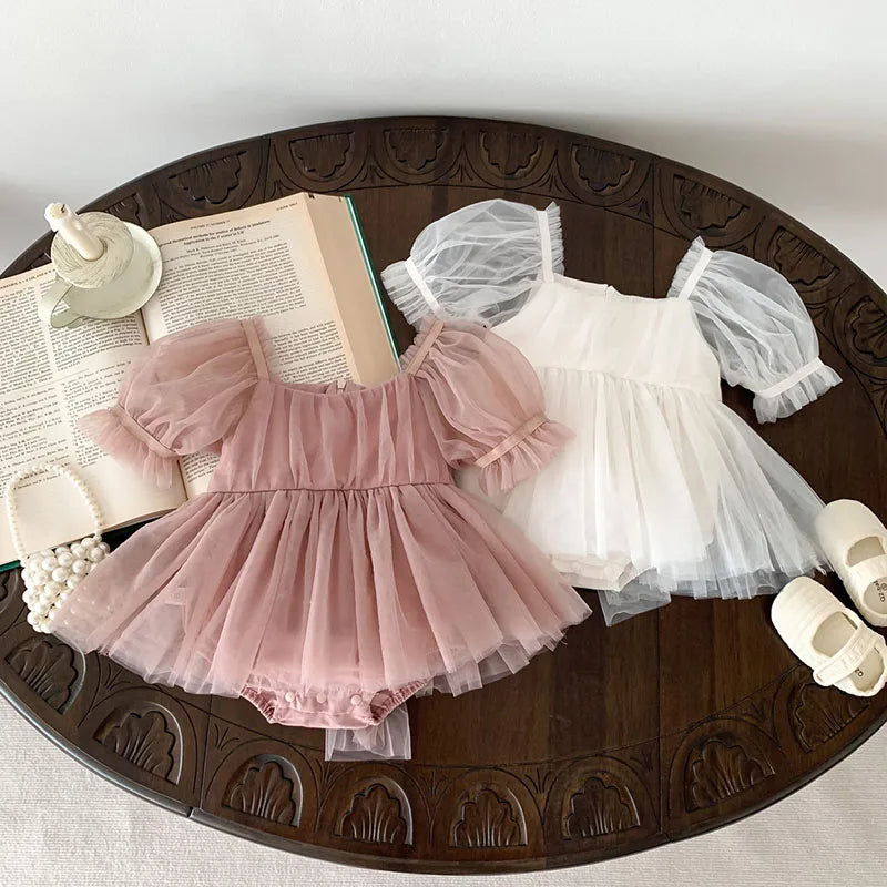 Dress your toddler in sweet style with this new baby lace dress featuring a big bowknot and short sleeves—perfect for special occasions! -