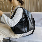 Make a stylish statement with these large shoulder bags designed for women. Crafted from soft leather, these fashionable handbags are perfect for adding a touch of sophistication to any outfit. -