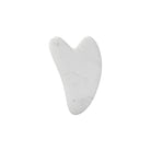 Enhance your skincare routine with this facial roller for the face, neck, and eyes. This resin massage tool can help improve circulation, reduce puffiness, and promote relaxation for a revitalized complexion. -