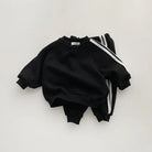 Keep your little one stylish and comfy with this cool two-piece baby suit—featuring a letter-printed zip-up top and matching leisure sports pants! -