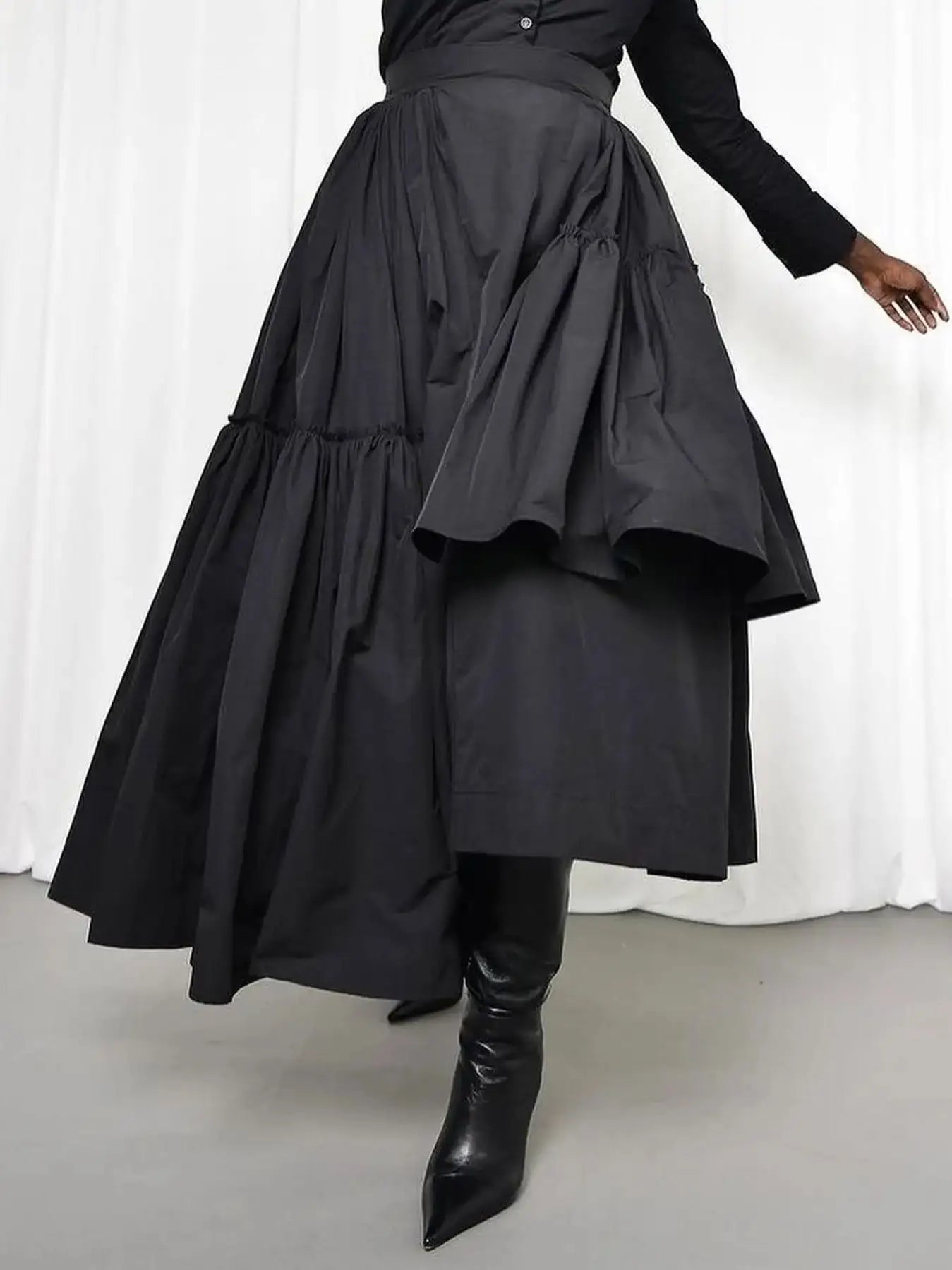 Make a bold statement with this black taffeta asymmetrical women's skirt—a chic and unique addition to your wardrobe! -