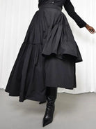 Make a bold statement with this black taffeta asymmetrical women's skirt—a chic and unique addition to your wardrobe! -