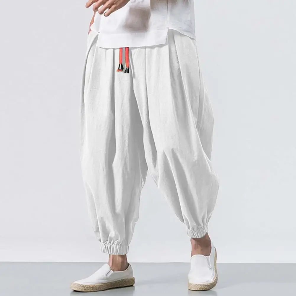 Stay comfortable and stylish in these men's baggy jogging pants featuring a drawstring waist—an ideal choice for a relaxed and casual look! -