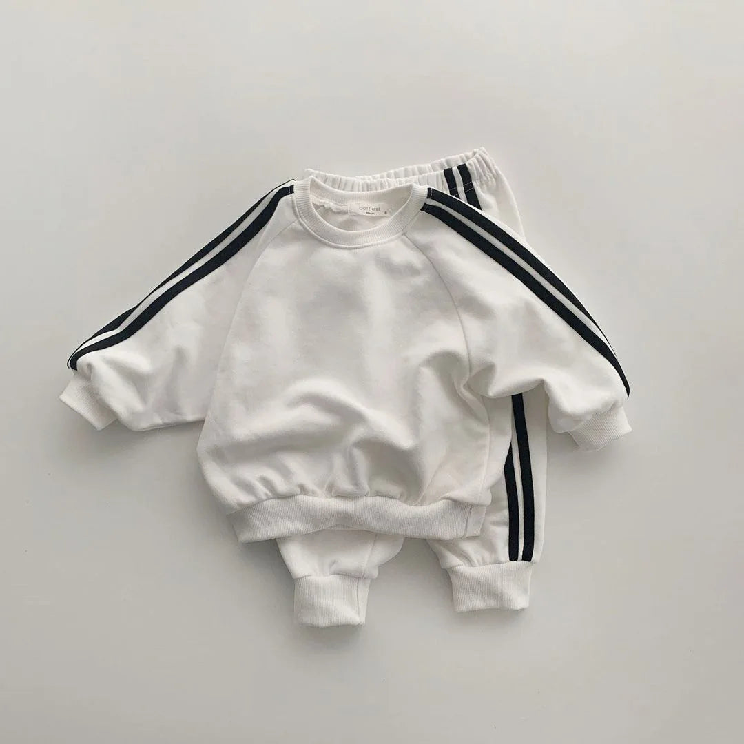 Keep your little one stylish and comfy with this cool two-piece baby suit—featuring a letter-printed zip-up top and matching leisure sports pants! -