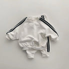 Keep your little one stylish and comfy with this cool two-piece baby suit—featuring a letter-printed zip-up top and matching leisure sports pants! -