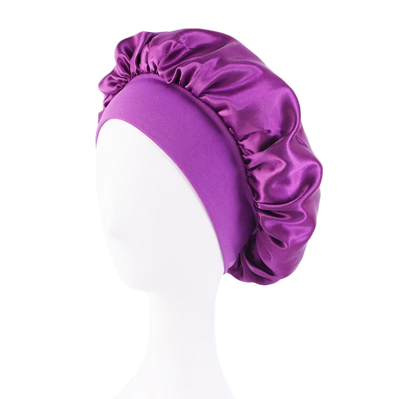 Protect your hair in style with these satin solid bonnets. Featuring a wide-brim design, these hats are perfect for night sleeping or bathing and are suitable for both men and women. -