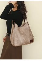 Stay organized and stylish with this large work tote bag for women. Designed with designer PU leather, this big bucket bag is perfect for carrying all your essentials in a chic and fashionable way. -