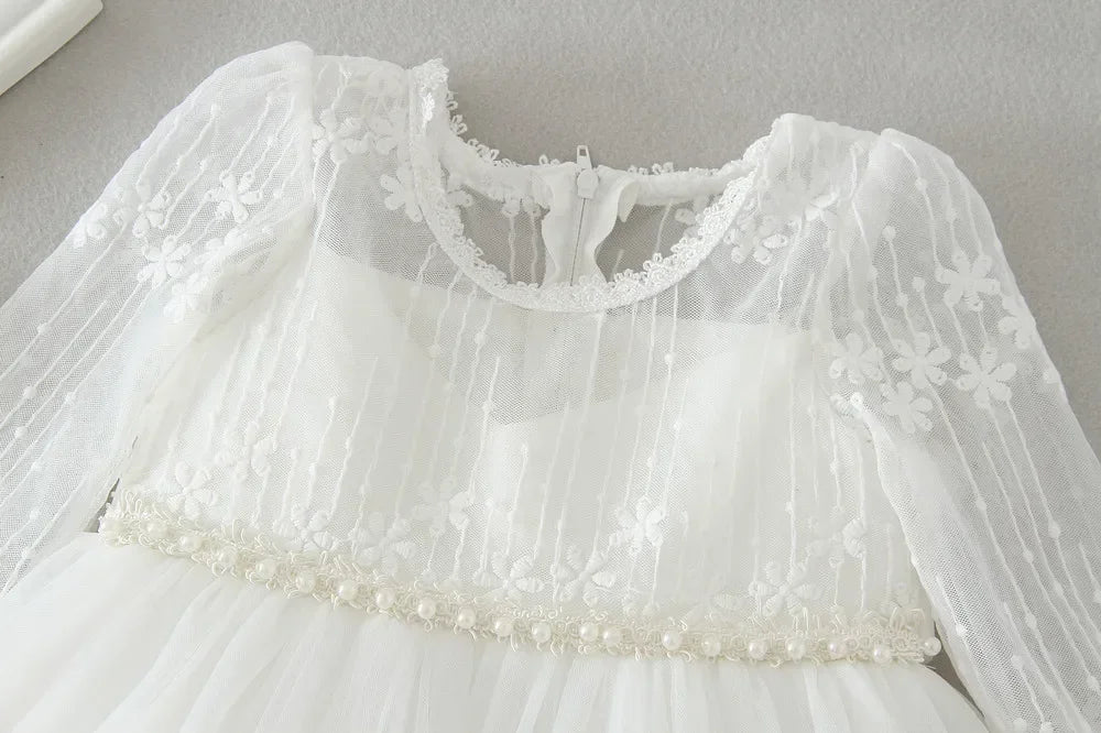 Make your baby girl shine in this elegant long-sleeve white party dress—perfect for special occasions! -