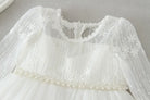 Make your baby girl shine in this elegant long-sleeve white party dress—perfect for special occasions! -