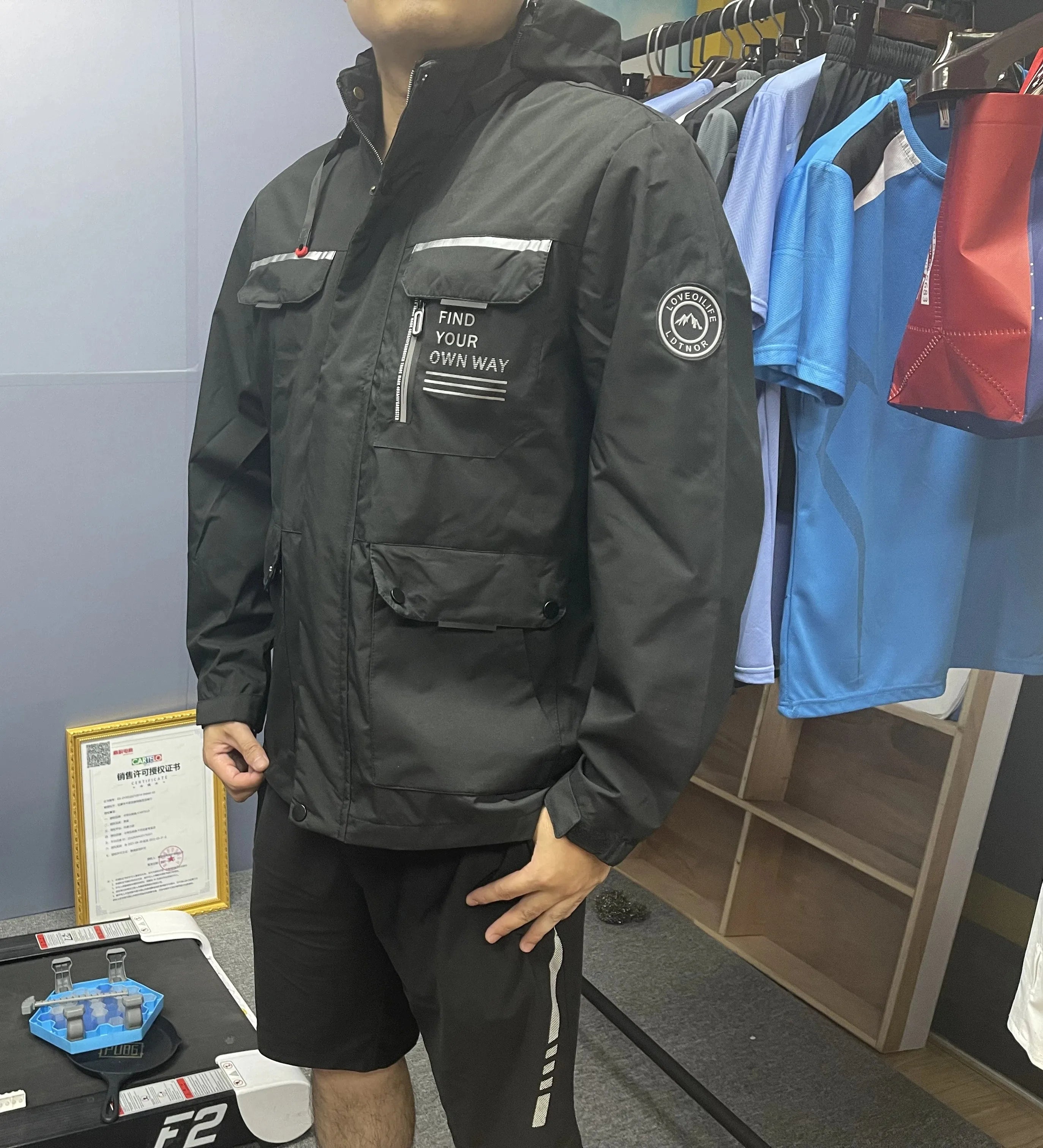 Stay protected from the elements with this men's windbreaker—a versatile and functional outerwear piece designed to keep you dry, windproof, and comfortable during outdoor activities. -
