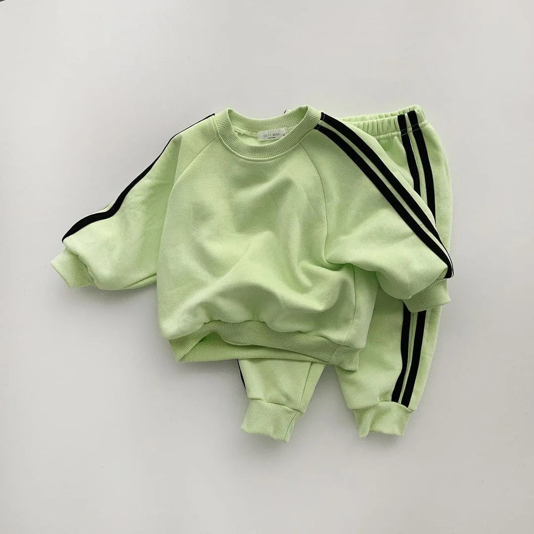 Keep your little one stylish and comfy with this cool two-piece baby suit—featuring a letter-printed zip-up top and matching leisure sports pants! -