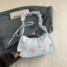 Stay stylish with these chic women's handbags made from nylon. Featuring a pleated design, these bags are perfect for the summer season, offering a trendy and functional accessory for your everyday outfits. -