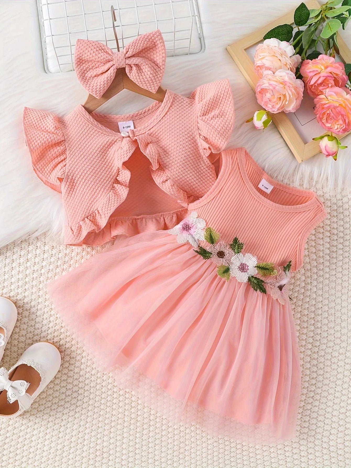 Dress your little princess in style with this pink waffle cardigan and embroidered dress set—perfect for ages 1-2 years and adding a cozy, elegant touch! -