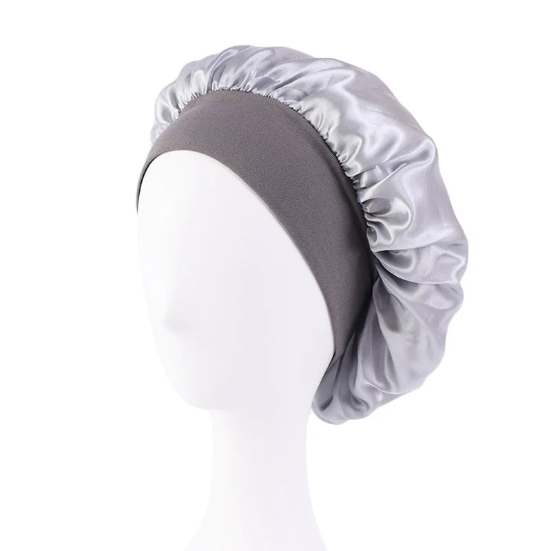 Protect your hair in style with these satin solid bonnets. Featuring a wide-brim design, these hats are perfect for night sleeping or bathing and are suitable for both men and women. -