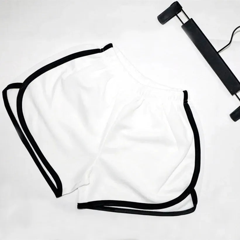 Stay comfortable and stylish with these elastic shorts for women. With a loose fit and quick-drying fabric, these shorts are perfect for active days or lounging at home. -