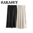 Elevate your elegance with this sleek black satin skirt for women—perfect for any occasion! -