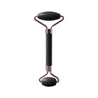 Enhance your skincare routine with this facial roller for the face, neck, and eyes. This resin massage tool can help improve circulation, reduce puffiness, and promote relaxation for a revitalized complexion. -