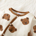 Keep your newborn baby boy cozy and adorable this spring with this 2-piece set—featuring a long-sleeved bear print romper and matching hat, perfect for ages 0-1 year! -