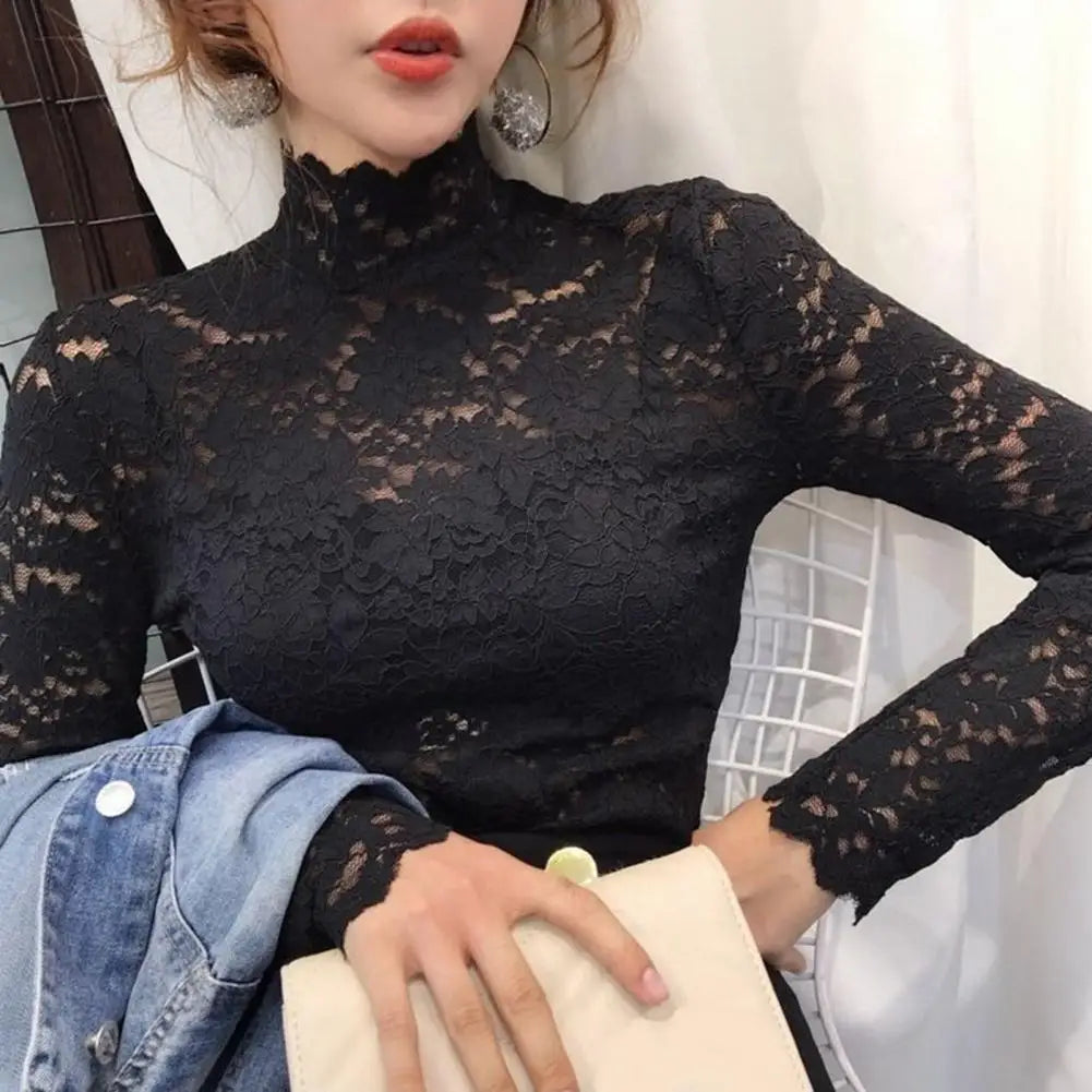 Achieve an elegant and feminine look with this long sleeve lace crochet top. The see-through design adds a touch of allure and sophistication to your outfit. -