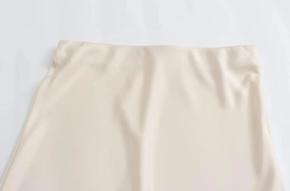 Elevate your elegance with this sleek black satin skirt for women—perfect for any occasion! -