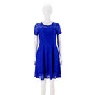 Make a chic statement with this elegant women's dress featuring an O-neck design, transparent lace, and hollow detail—a perfect choice for a sophisticated and stylish look. -