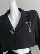 Make a statement with these loose-fit blazers for women featuring trendy chain designs—fashion-forward and effortlessly chic! -