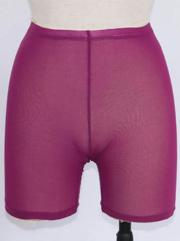 Stay stylish and comfortable with these yellow mesh transparent casual shorts for women—perfect for a fashionable and chic look! -