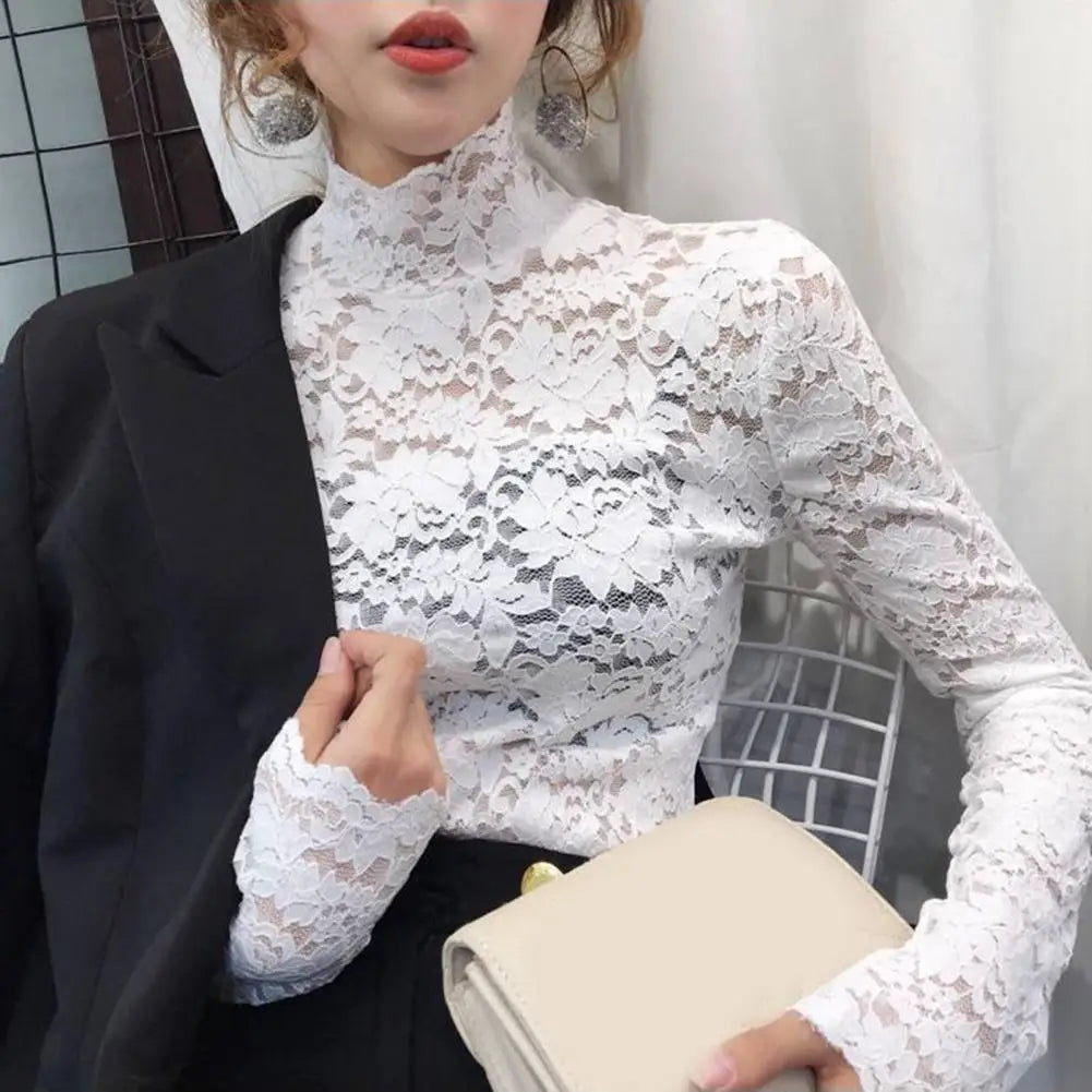 Achieve an elegant and feminine look with this long sleeve lace crochet top. The see-through design adds a touch of allure and sophistication to your outfit. -
