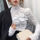 Achieve an elegant and feminine look with this long sleeve lace crochet top. The see-through design adds a touch of allure and sophistication to your outfit. -