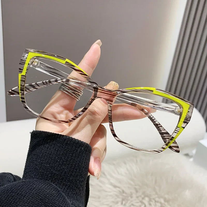 Protect your eyes with style using these cat-eye frames for women, featuring anti-blue light blocking lenses for comfortable and fashionable eyewear! -