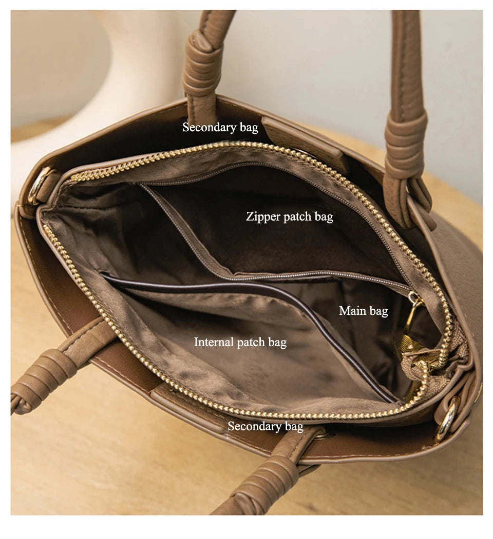Upgrade your accessories with this new bucket bag for women. Featuring a fashionable and versatile design, this handheld bag is perfect for adding a chic and trendy touch to your look. -