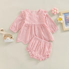 Keep your toddler cozy and cute in this 2-piece set featuring a solid color cutout round neck long sleeve top and matching bottoms—perfect for baby girls 3-24m! -