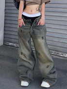 Rock the retro vibe with these baggy distressed low-rise vintage denim pants—loose, patched, and perfect for a cool mom style! -