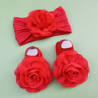 Complete your baby girl's outfit with this sweet 2-piece set—featuring delicate pearl, lace, and flower headbands along with matching socks! -