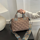 Elevate your style with these luxury designer shoulder crossbody bags for women. Featuring a quilted padded design from a top designer brand, these handbags are perfect for adding a touch of elegance to any outfit. -