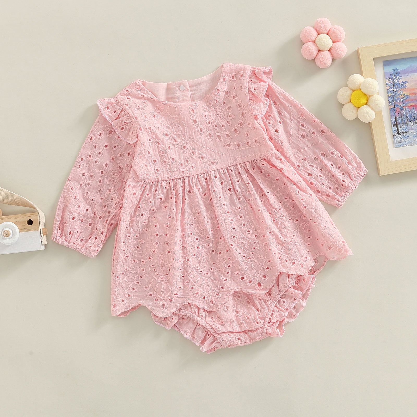 Keep your toddler cozy and cute in this 2-piece set featuring a solid color cutout round neck long sleeve top and matching bottoms—perfect for baby girls 3-24m! -